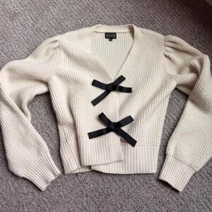 Cream and black bow tie